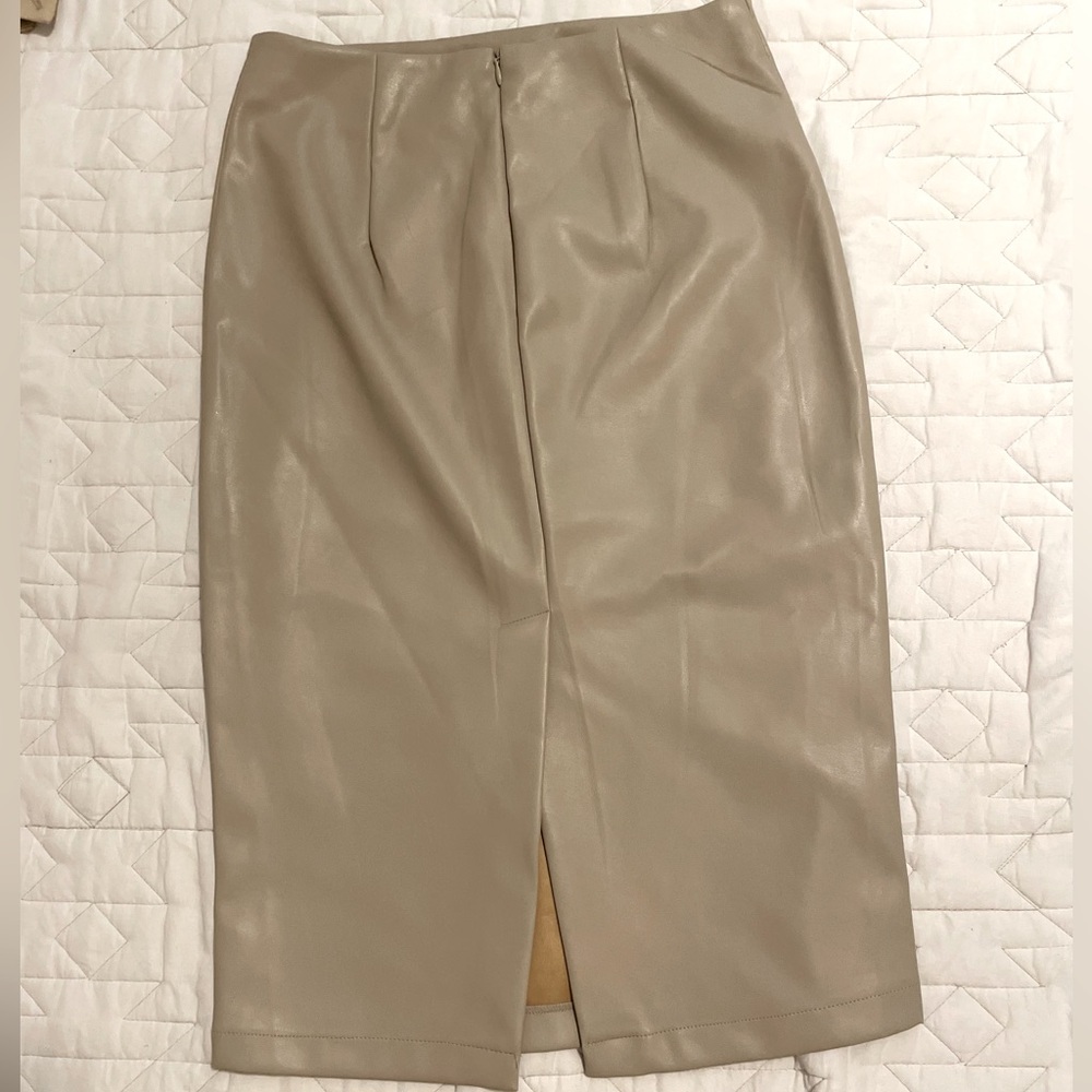 Small, knee length, pencil skirt. Casual/business attire